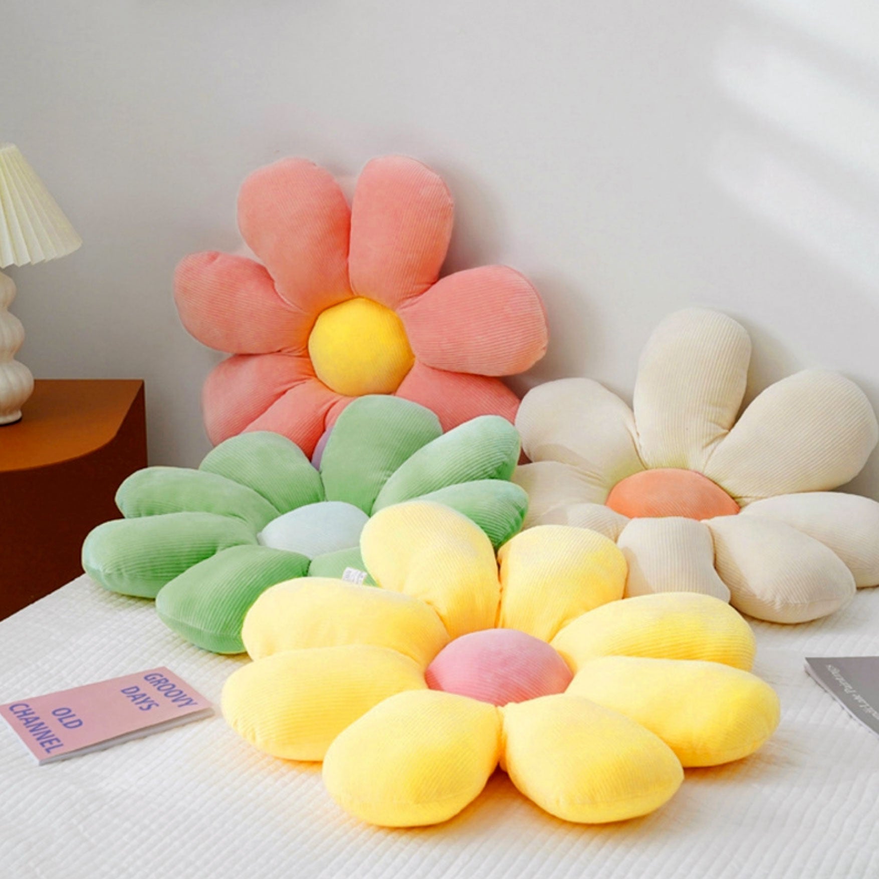 Daumenkissen mit flauschigem Gänseblümchen-Motiv