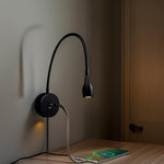Flexible wall light with USB charging port and touch control