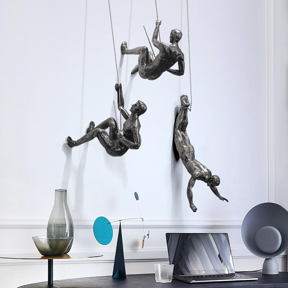 Kletterfiguren Wanddekoration – Inspirierende Wandkunst aus Resin und Eisen