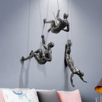 Kletterfiguren Wanddekoration – Inspirierende Wandkunst aus Resin und Eisen