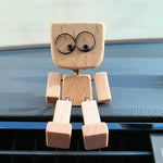 Verspielte Holzfigur mit sanfter Wippfunktion und wechselbaren Emotionen