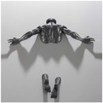 Kreative Wandkunst: 3D Skulptur aus Harz mit Kletterer