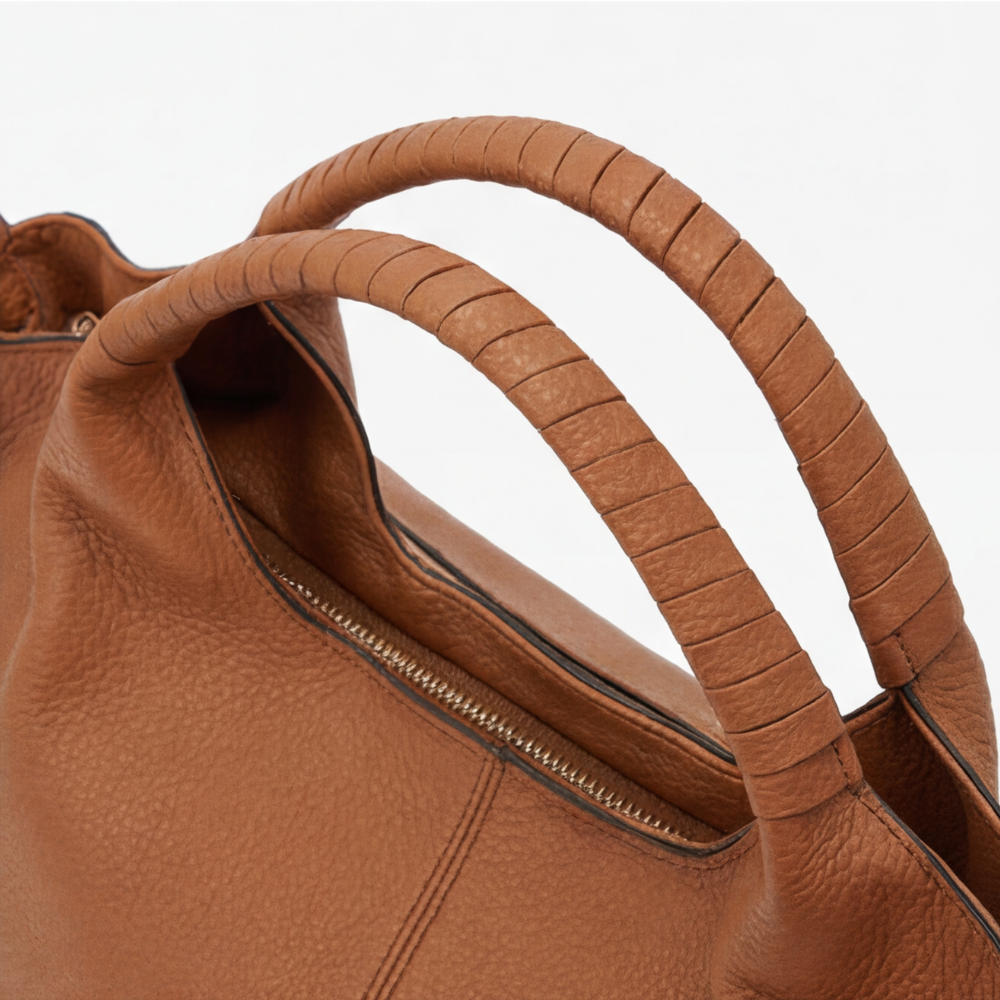 Elegante Hobo-Tasche aus weichem Kunstleder mit Fächern