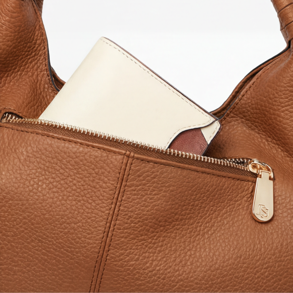 Elegante Hobo-Tasche aus weichem Kunstleder mit Fächern
