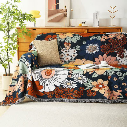 Stylish cotton throw with floral accents and fringes
