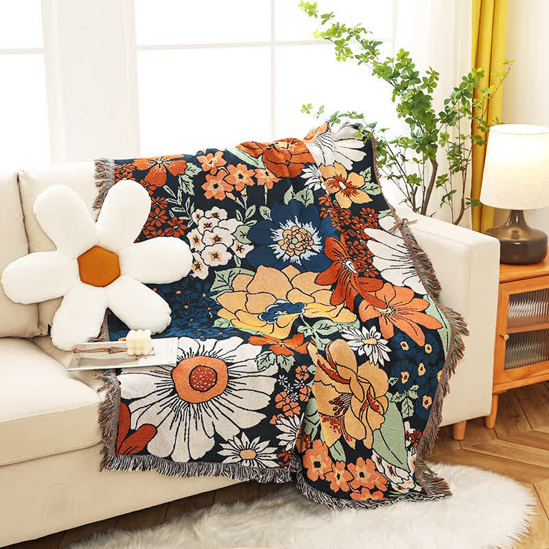Stylish cotton throw with floral accents and fringes