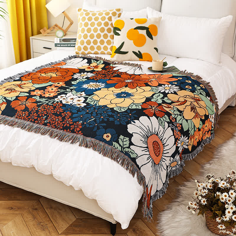 Stylish cotton throw with floral accents and fringes