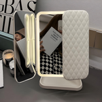 Illuminated cosmetic mirror with adjustable angle