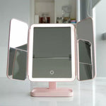 Illuminated cosmetic mirror with adjustable angle