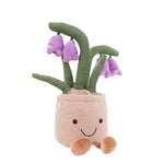 Plüschfigur mit fröhlichem Blumendesign