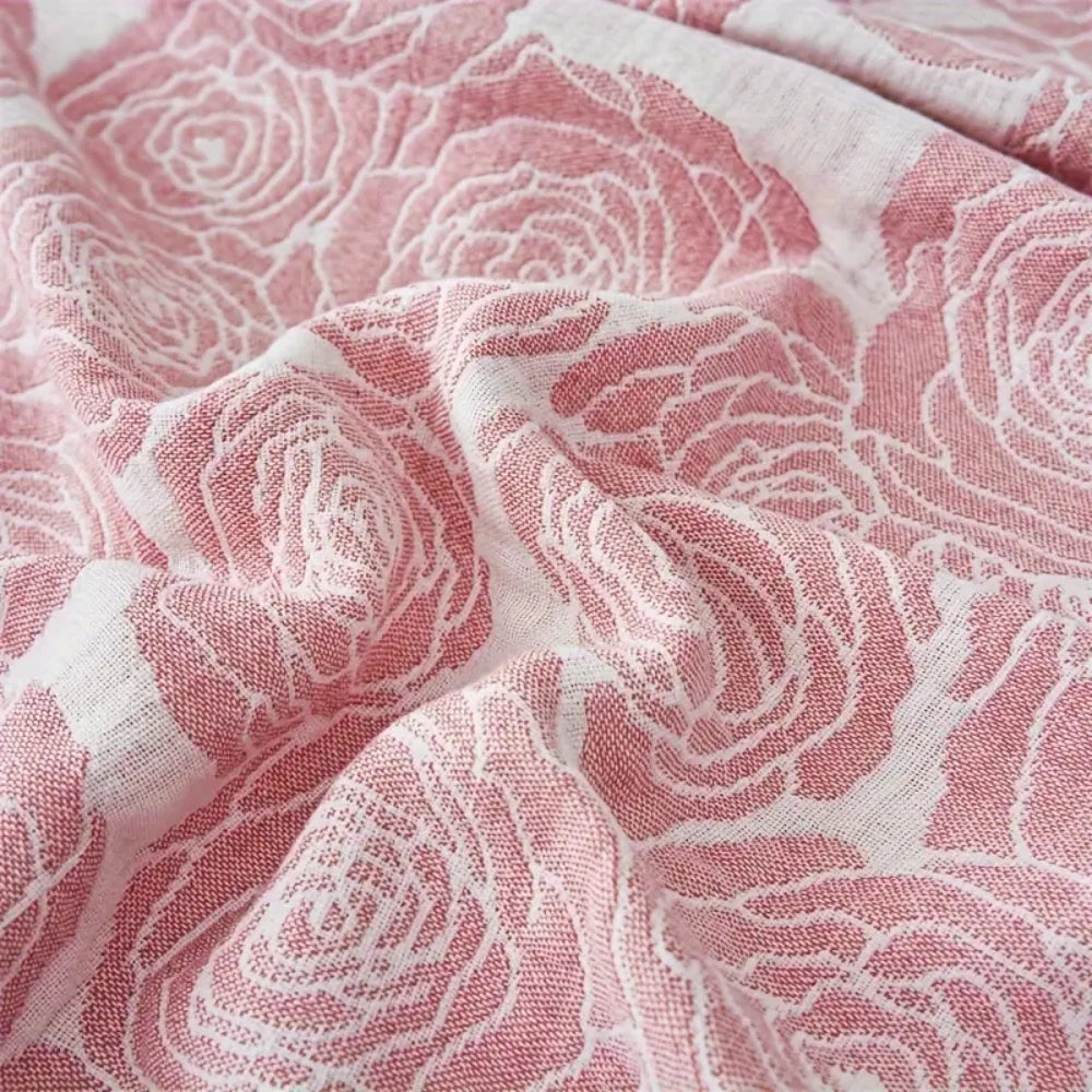 Florale Eleganz: Rosa Baumwoll-Decke für jedes Zuhause