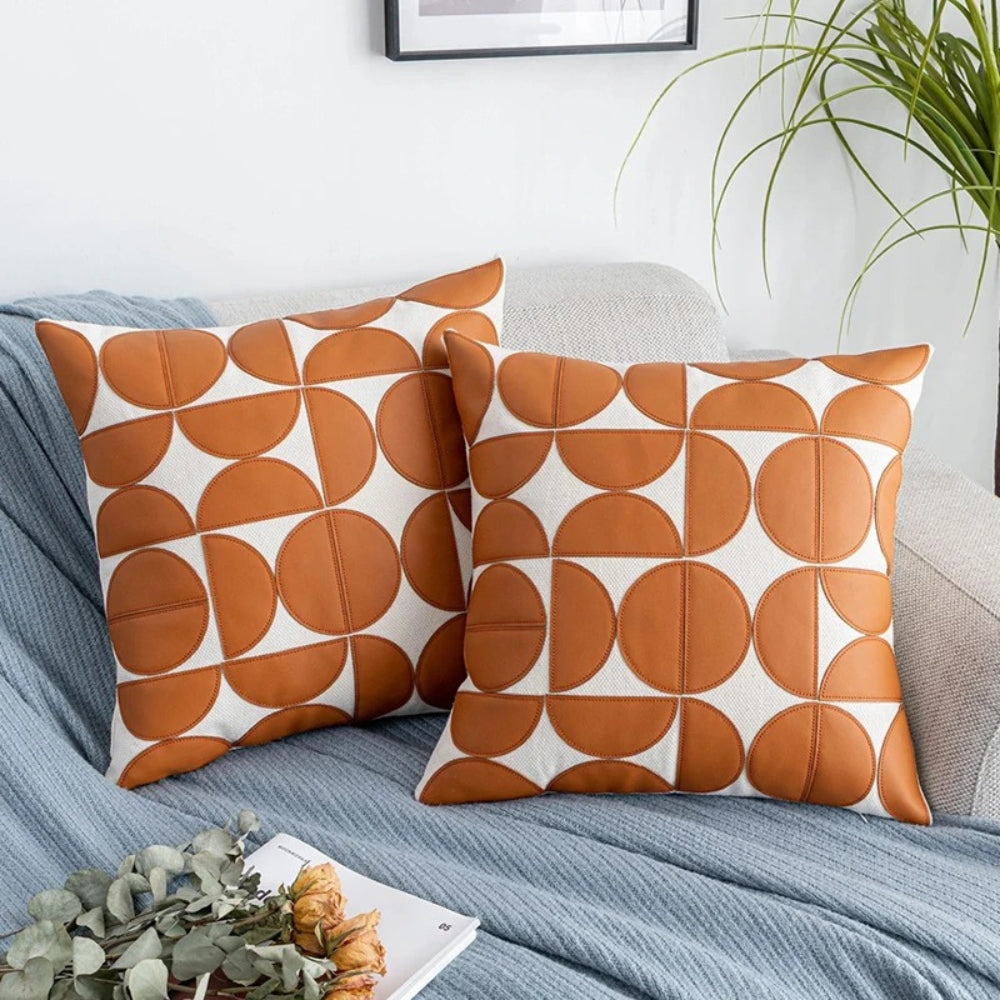 Elegant faux leather cushion cover with a modern geometric pattern