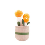 Plüschfigur mit fröhlichem Blumendesign