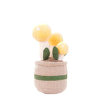 Plüschfigur mit fröhlichem Blumendesign