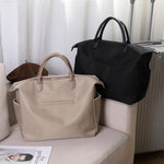 Elegant diaper bag with sophisticated storage space