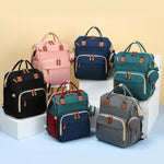 Practical baby backpack with fold-out changing mat – 2-in-1