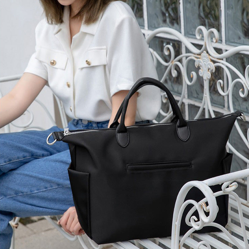Elegant diaper bag with sophisticated storage space
