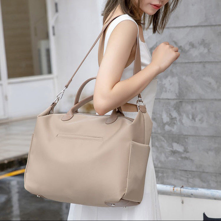 Elegant diaper bag with sophisticated storage space