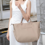 Elegant diaper bag with sophisticated storage space