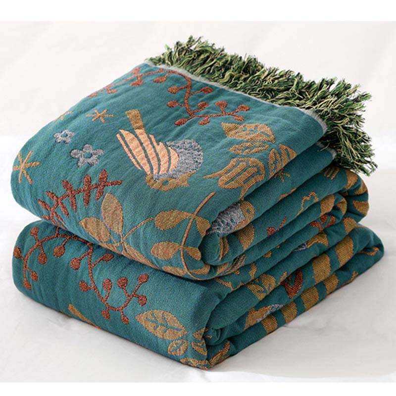 Reversible cotton blanket with floral and bird motif