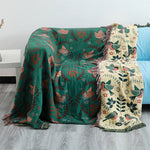 Reversible cotton blanket with floral and bird motif