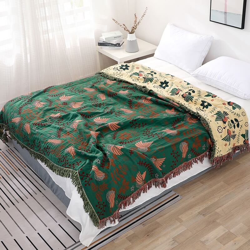 Reversible cotton blanket with floral and bird motif