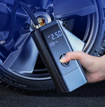 Portable air compressor for tire inflation