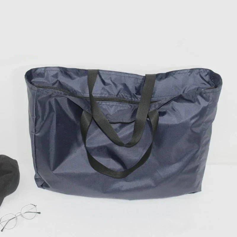 Kompakte Reisetasche | Wasserabweisend | Leicht und Platzsparend | ReiseGenie