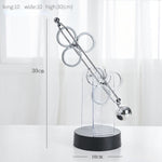 Kinetische Eleganz | Rotierendes Pendel Ornament