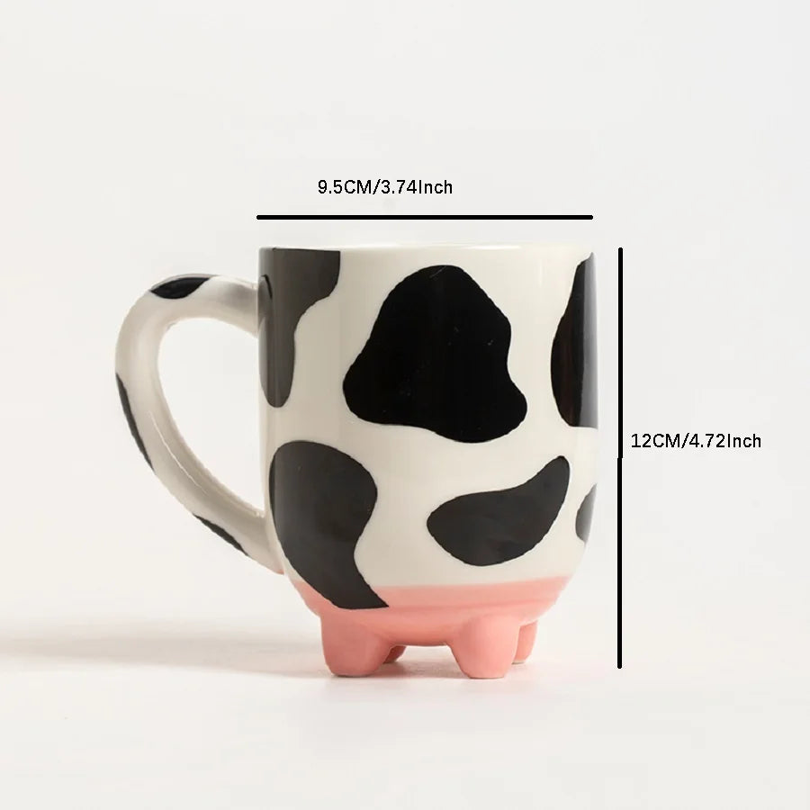 Lustige Milchkanne: Kaffeetasse mit Kuhdesign