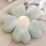 Plüschiges Kissen mit Kleeblattblüten