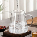 Elegant teapot made of heat-resistant glass with a stainless steel filter