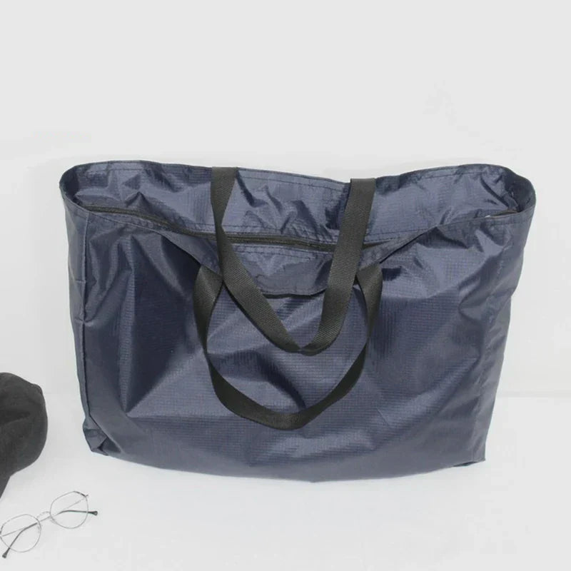 Praktische Faltbare Reisetasche – 4 Größen, Schwarz oder Blau