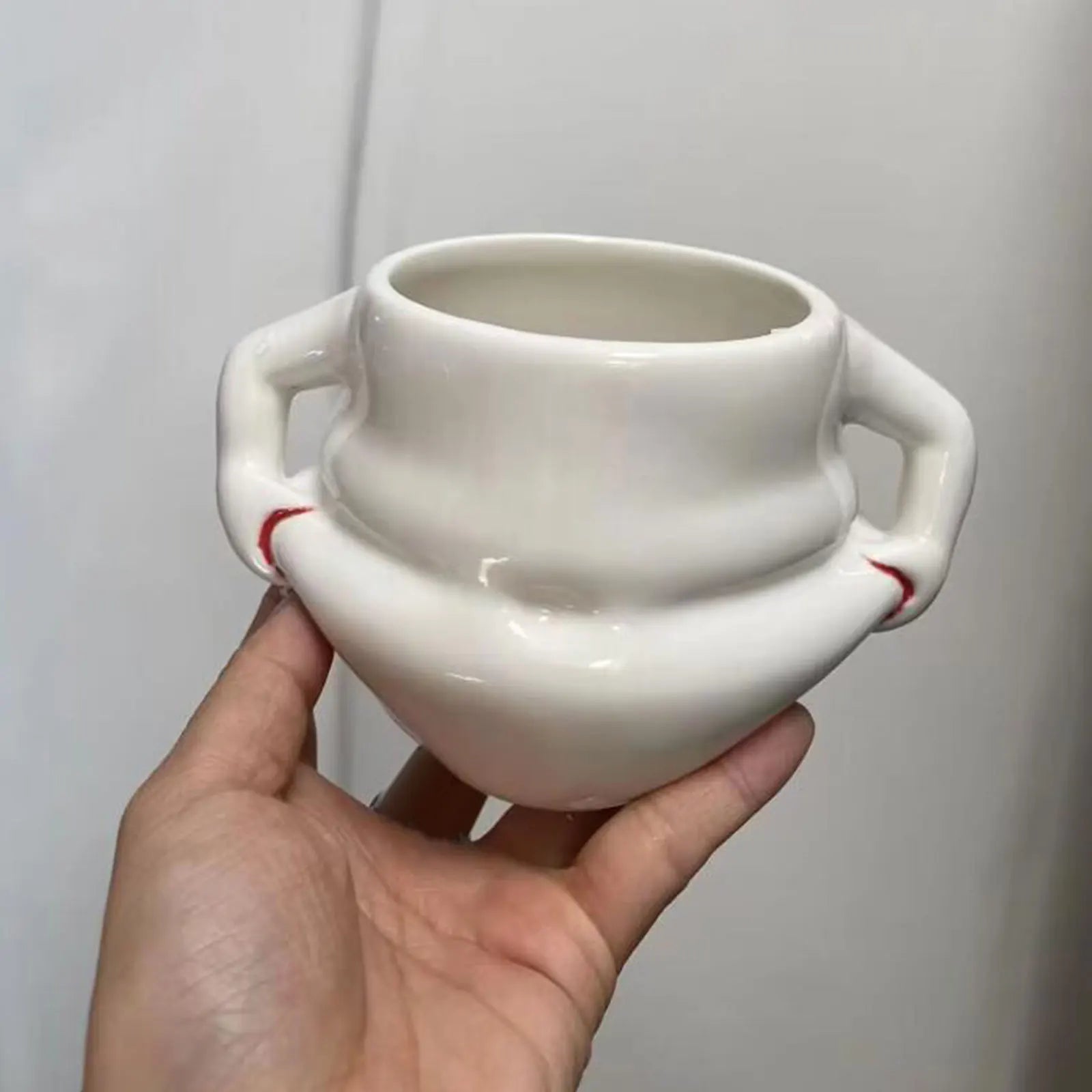Die charmante Kaffeetasse mit lustigen Griffen