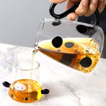 Glaskrug mit Kuhdesign und Becher