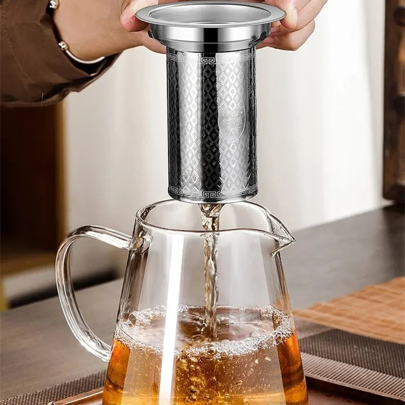 Elegant teapot made of heat-resistant glass with a stainless steel filter