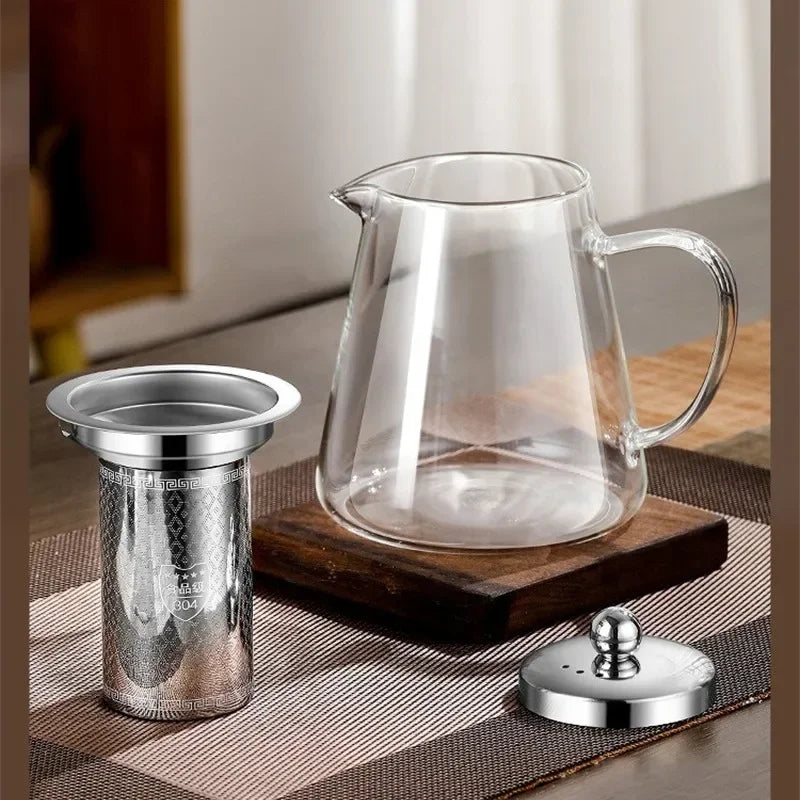 Elegant teapot made of heat-resistant glass with a stainless steel filter