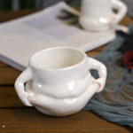 Die charmante Kaffeetasse mit lustigen Griffen