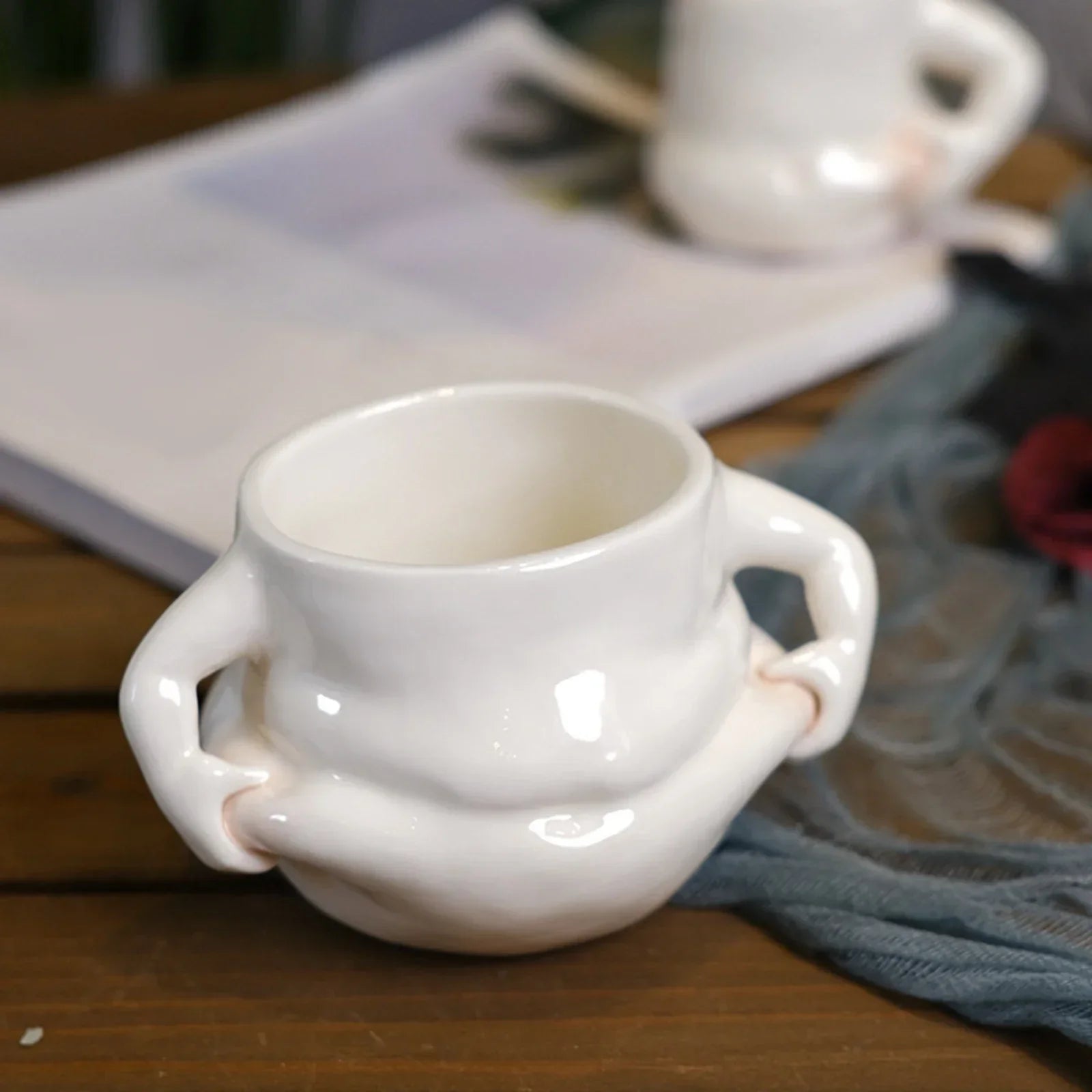 Die charmante Kaffeetasse mit lustigen Griffen