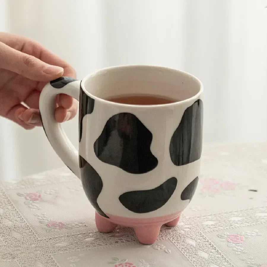 Lustige Milchkanne: Kaffeetasse mit Kuhdesign