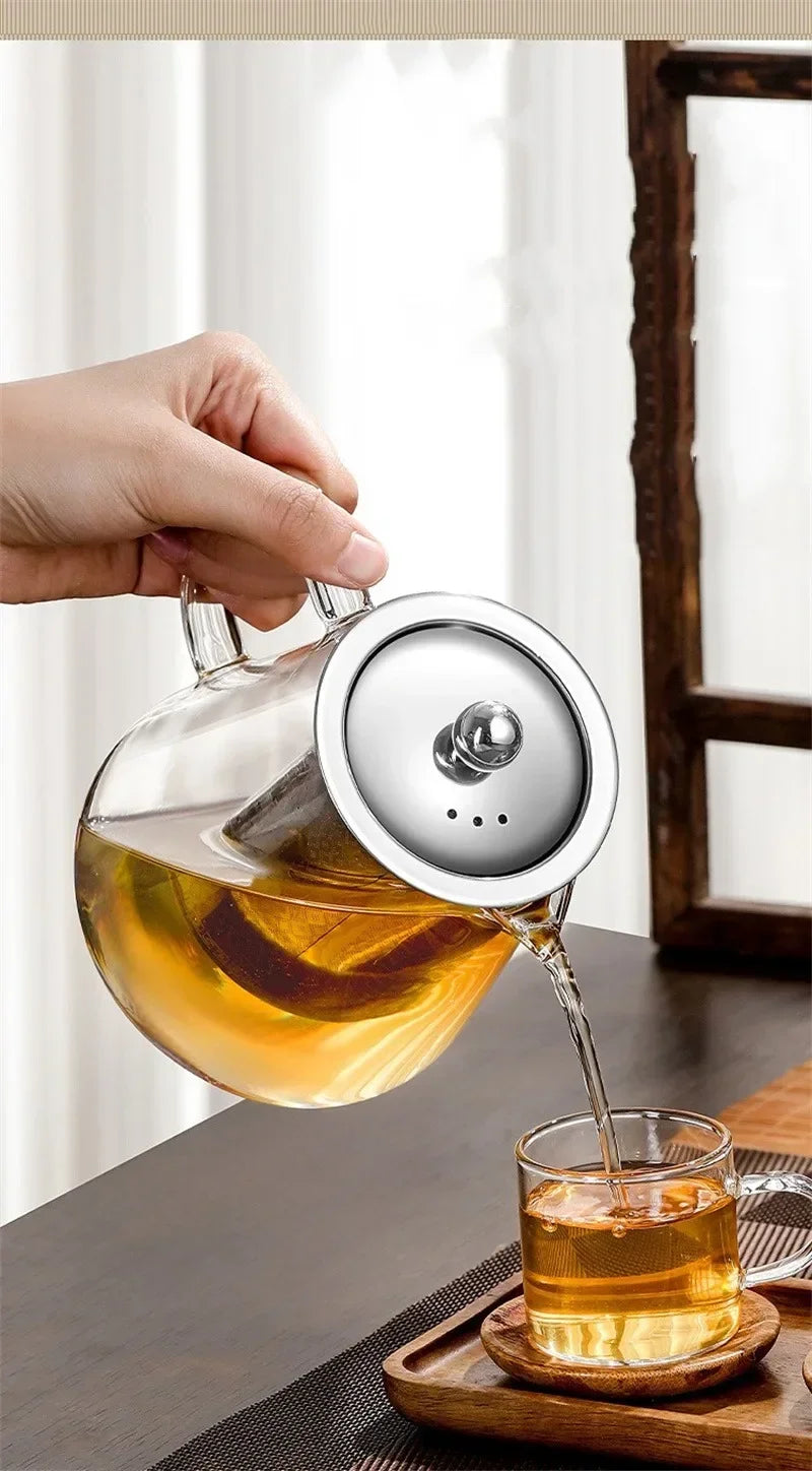 Elegant teapot made of heat-resistant glass with a stainless steel filter