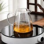 Elegant teapot made of heat-resistant glass with a stainless steel filter