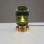 Elegante Tischlampe mit ovalem Glasdesign und sanfter Beleuchtung