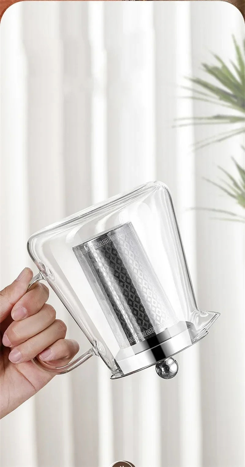 Elegant teapot made of heat-resistant glass with a stainless steel filter
