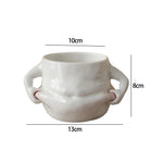 Die charmante Kaffeetasse mit lustigen Griffen
