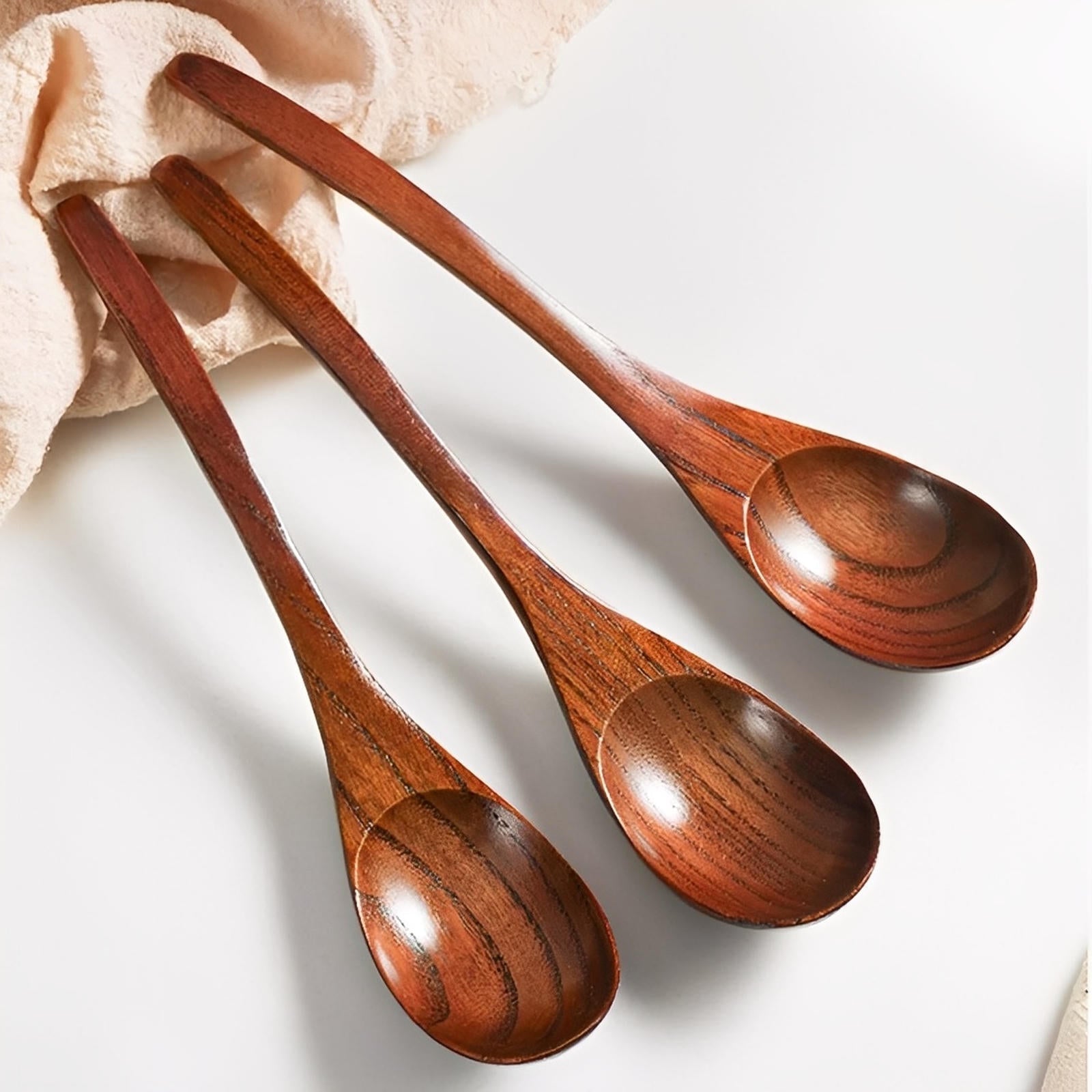 3-teiliges Set von Servierlöffeln aus Walnussholz mit ergonomischem Griff