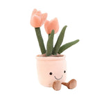 Plüschfigur mit fröhlichem Blumendesign