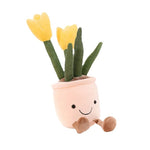 Plüschfigur mit fröhlichem Blumendesign