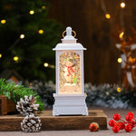 Holiday Lantern Illuminated Snowfall Santa Scene