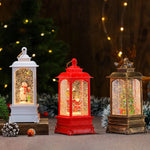 Holiday Lantern Illuminated Snowfall Santa Scene